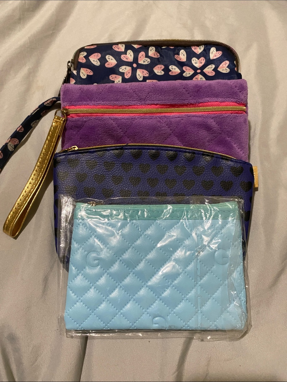 Bundle of little cosmetic pouches